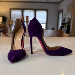 Louboutin purple stilettos